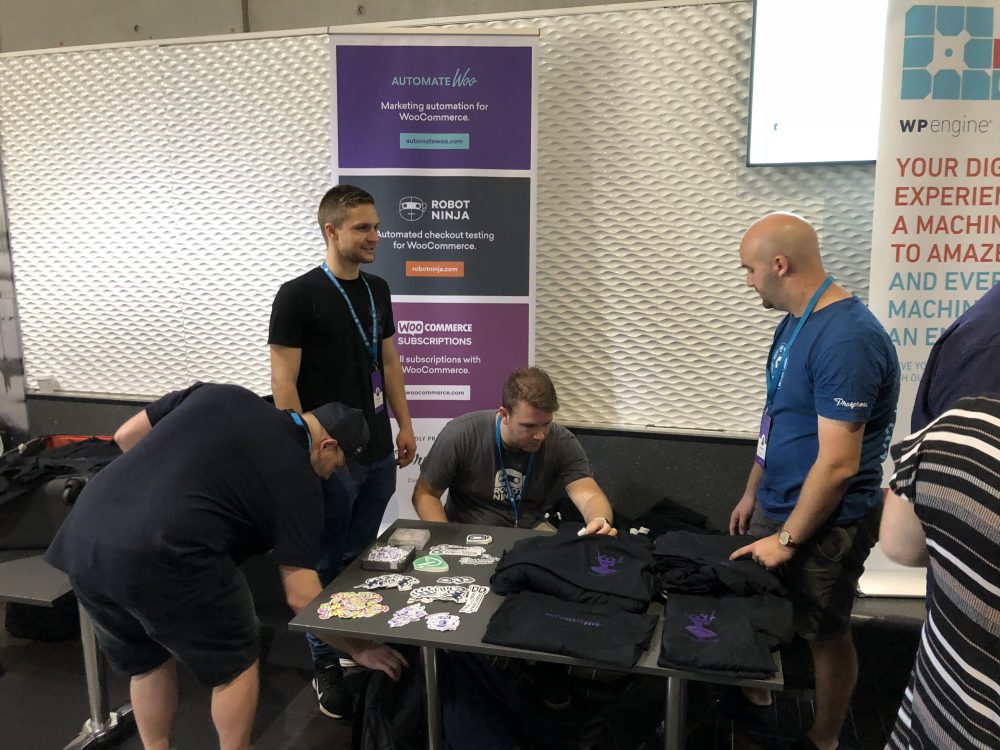Giving out swag at WordCamp Brisbane!